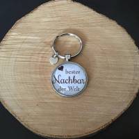 Schicker  Cabochon-Schlüsselanhänger „Bester Nachbar der Welt“ Bild 2