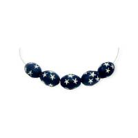 5 Acryl-Perlen oval 17 x 12mm, matt, dunkelblau mit silbernen Sternen Bild 1
