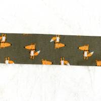 Pfiffiges Haarband aus Baumwollstoff mit Fuchs-Motiven. Einheitsgröße durch eingefasstes Gummiband. Bild 3