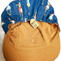 2in1, weiche Wende-Kappe, aus Baumwolle, entweder uni gelbgestreift oder blau mit sommerlichem Möwen-Muster Bild 4
