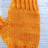 Baby Armstulpen Orange mit Klappbund - bis 16 Monate Bild 2