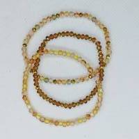 Armband, 3 Stück, mit facettierten Glasperlen auf Gummiband, braun/Gold Töne Bild 2