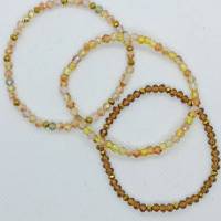 Armband, 3 Stück, mit facettierten Glasperlen auf Gummiband, braun/Gold Töne Bild 3