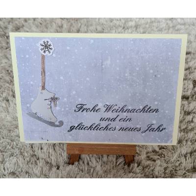 Weihnachtskarte mit Schlittschuhe - Frohe Weihnachten - Schneeflocke