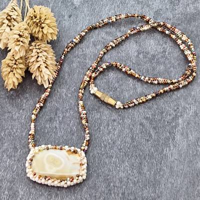 Mystische Eleganz: Halskette mit faszinierendem Augenachat-Anhänger