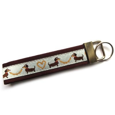 Schlüsselanhänger Dackel mit Wurst Wurstkette aus Baumwollstoff und Webband
