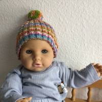 Puppenmütze mit Bommel bunt gemustert für Puppengröße ca. 56 cm, handgestrickt für große Puppen Bild 1