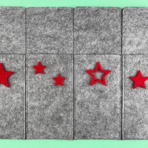 Set aus 4 Bestecktaschen rote Sterne aus Filz. Grundpreis: 1 Stück = 4,99 €. 4-teiliges Set Weihnachtliche Tischdeko. Bild 3