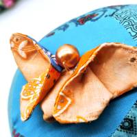 Schmetterling aus Stoff, orange/türkis mit Perle Bild 3