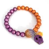 elastisches Armband aus magischen Leuchtperlen in Lila und Orange mit gestrickter bicolor Mini-Kugel Bild 1