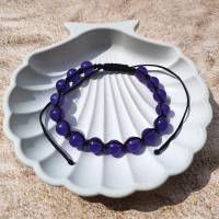 Knüpfarmband mit UV-Perlen blau-violett (Farbwechsel bei UV-Licht) Bild 1