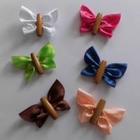 Schmetterlinge aus Stoff in sechs verschiedenen Farben mit Körper aus Holz Bild 1