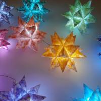 Bascettasterne 10 kleine Sterne, Motiv: Stern im Stern, transparent/bunt Bild 10