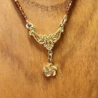 Dirndlkette / Trachtenkette Granatkette aus facettiertem, afrikanischem Granat-Perlen-Strang mit goldfarbigem Mittelteil Bild 7