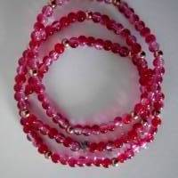 A2305 elastische Armbänder rot crackle Glasperlen spacer Metallperlen rosegold und einem Stern Metall antik silberfarben Bild 1