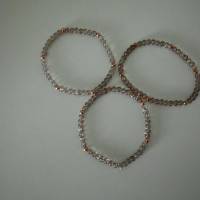 A2307 elastische Armbänder braun crackle Glasperlen spacer Metallperlen rosegold u. einem Stern Metall antik silberfarbe Bild 3