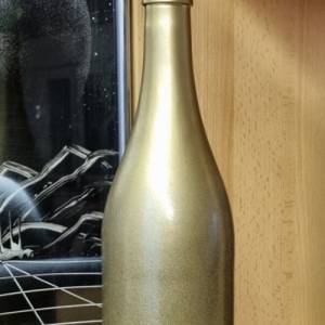 Dekorative Flasche in Kupfer mit Glitzereffekt. Perfekte Tischdekoration für die nächste Feier. Bild 1