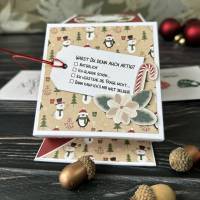 weihnachtliche Geschenkverpackung, Explosionsbox 10 x 10 cm, Pinguine und Schneemänner Bild 1