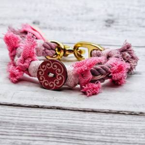 Verspieltes Baumwolltau-Armband in Rosa- und Pinktönen Bild 1