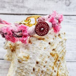 Verspieltes Baumwolltau-Armband in Rosa- und Pinktönen Bild 3