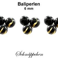 Baliperlen - schwarz-gold - ca. 6 mm Bild 1