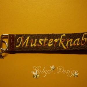 Schlüsselband aus Leder "Musterknabe" mit Metall-Schlüsselring Bild 1
