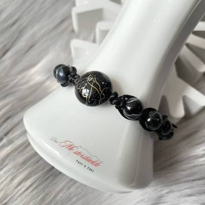 Perlenarmband Makramee-Armband handgemacht schwarz Schiebeknoten