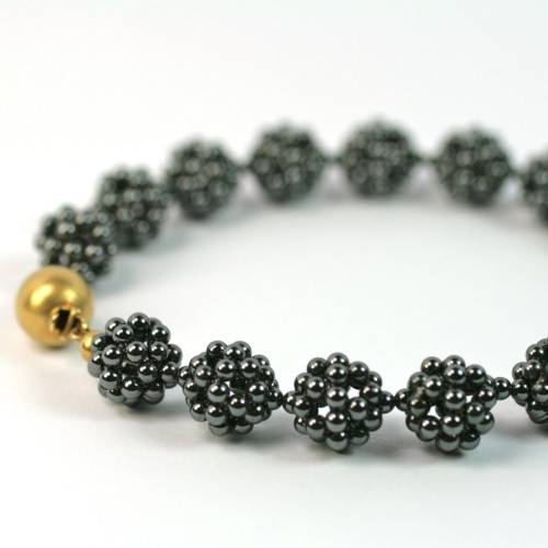 Hämatit 18 kt Gold Kugel Armband