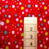 Baumwoll Jersey mit bunten Wassertropfen auf rot Meterware nähen Mitwachshose Shirt Geschenke Schultüte Bild 1