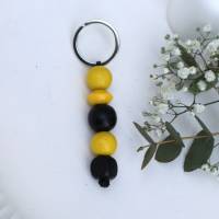 Schlüsselanhänger Taschenanhänger Holzperlen schwarz gelb Bild 1