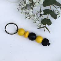 Schlüsselanhänger Taschenanhänger Holzperlen schwarz gelb Bild 2