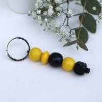 Schlüsselanhänger Taschenanhänger Holzperlen schwarz gelb Bild 3
