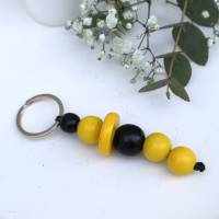 Schlüsselanhänger Taschenanhänger Holzperlen schwarz gelb #2 Bild 1