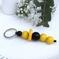 Schlüsselanhänger Taschenanhänger Holzperlen schwarz gelb #2 Bild 2