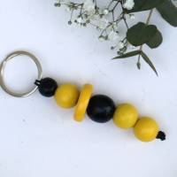 Schlüsselanhänger Taschenanhänger Holzperlen schwarz gelb #2 Bild 3