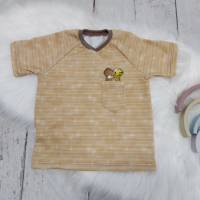 T-Shirt mit Brusttasche, Janosch beige, Gr. 68-146 Bild 1